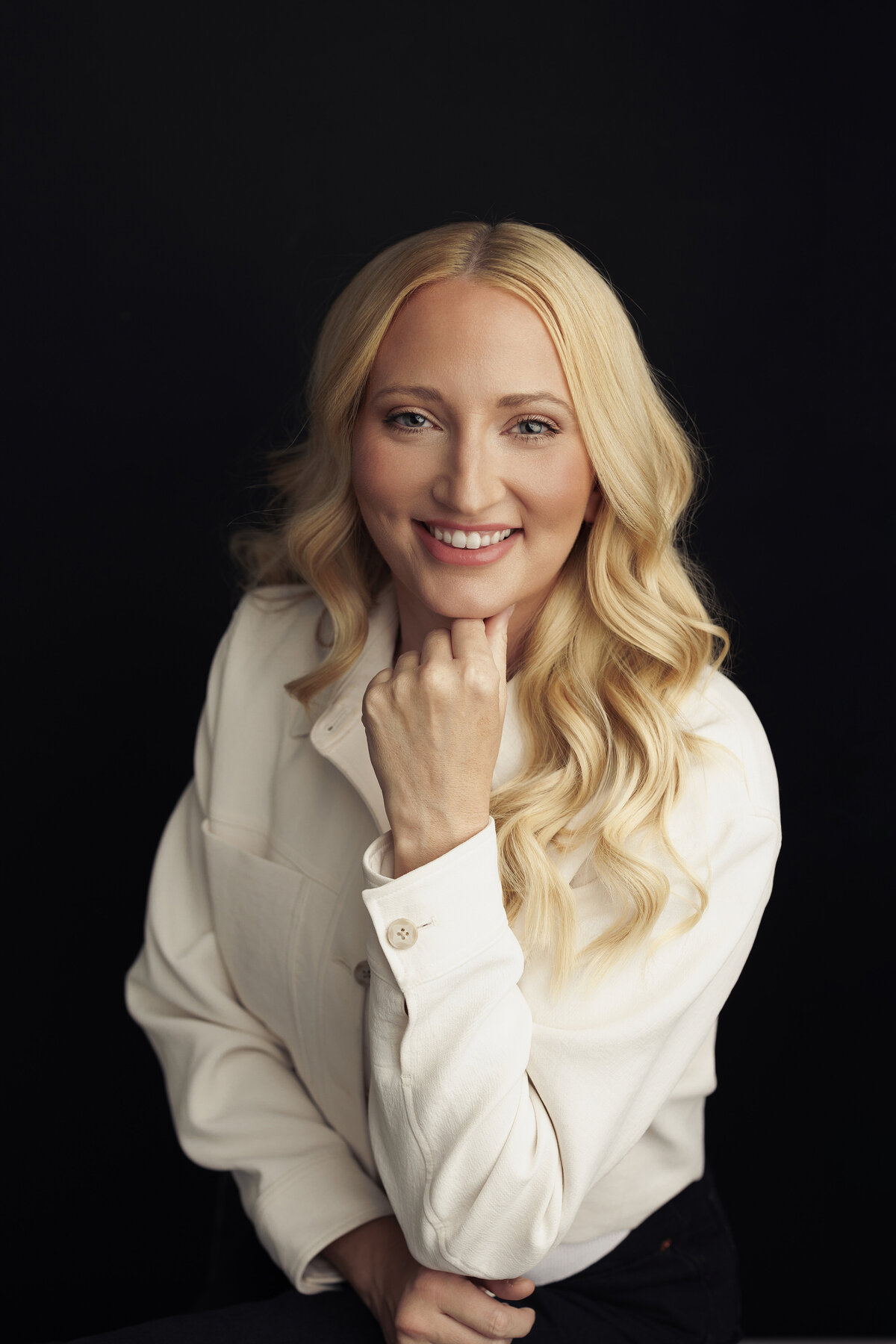 Personal branding portrait for a female executive in a contemporary studio setting by Haili Barton Photography.