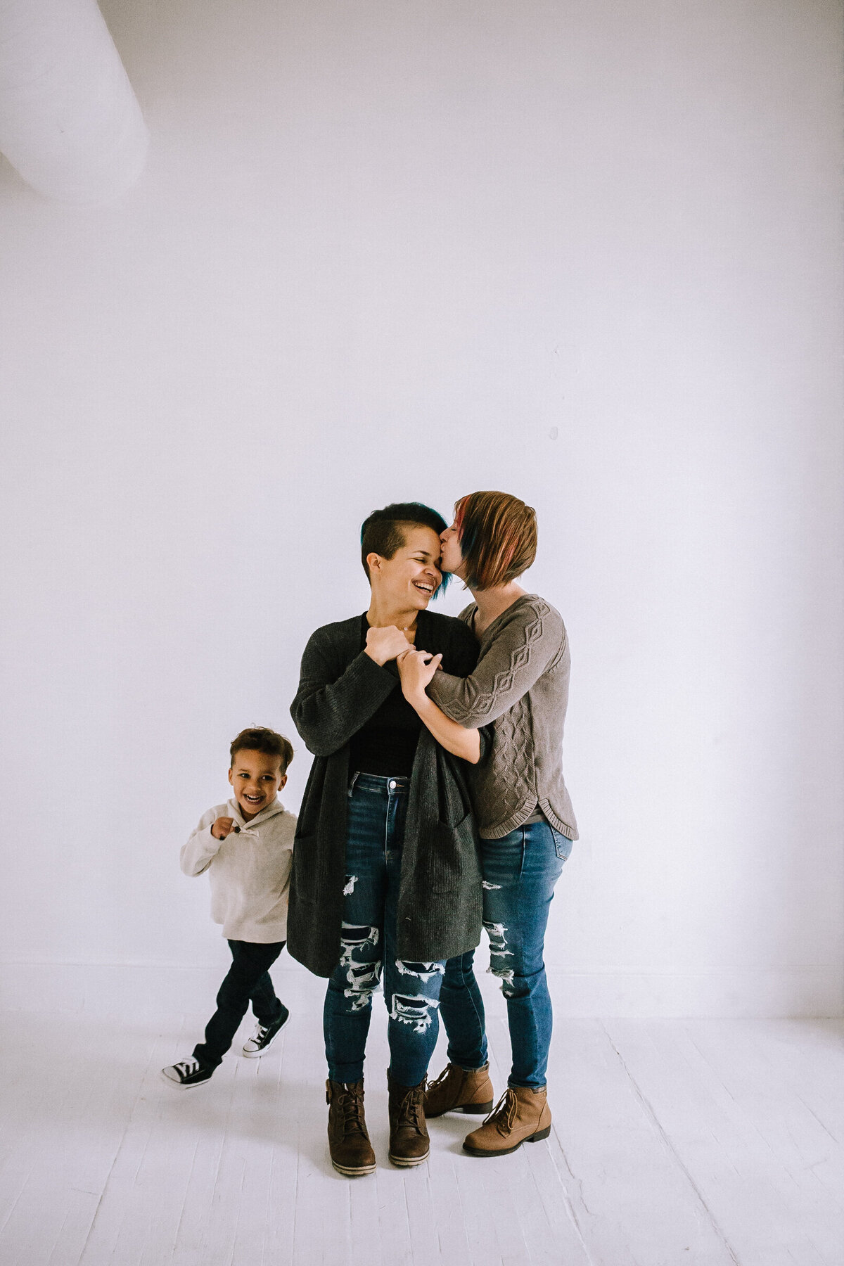 Same sex parents playing with their son, Pittsburgh. 