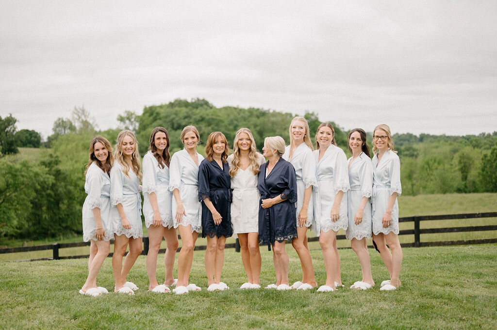 Bride and bridesmaids in an outdoor venue