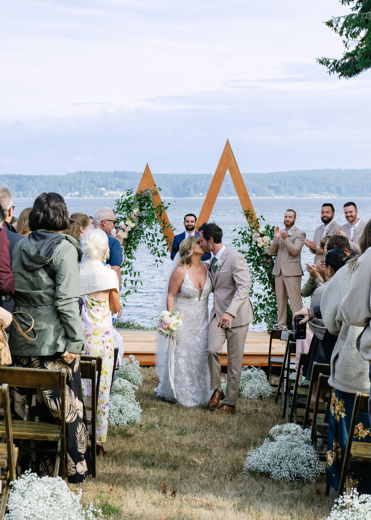 bride and groom just married overlooking puget sound