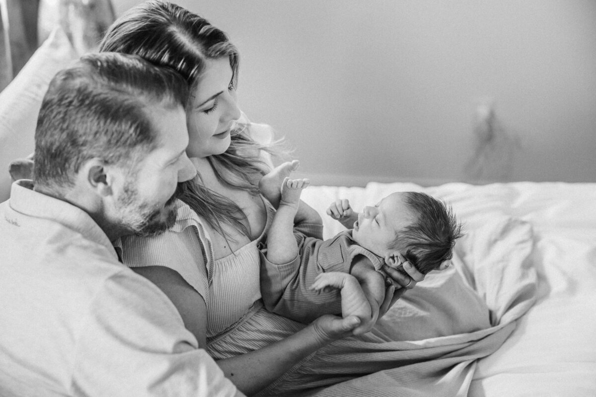 parents-look-down-on-baby