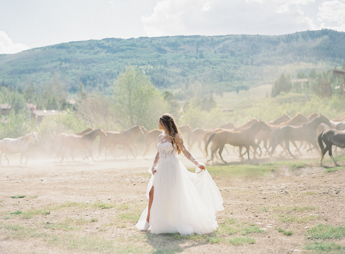 Western Horse Ranch Wedding in Colorado at C Lazy U with Gradient and Hue Florals