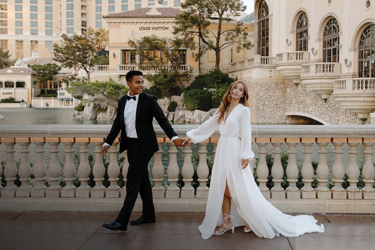 cool-young-bride-and-groom-eloping-vegas-louis-vuitton-building