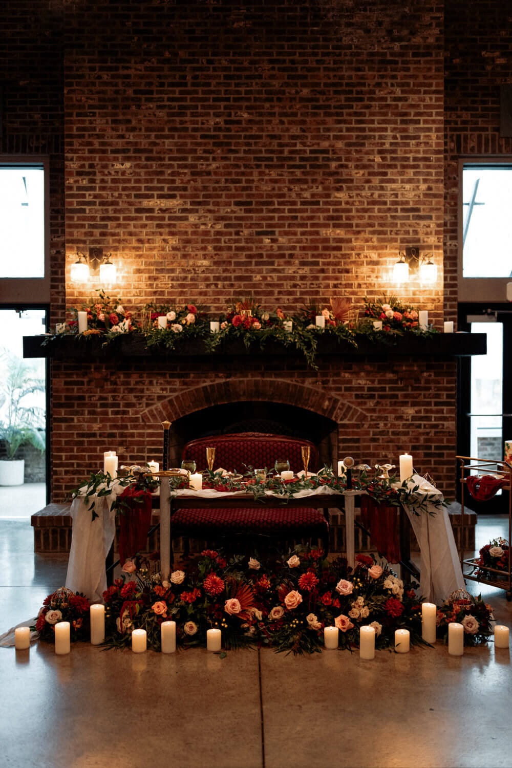Two swords are displayed amoung beautiful fall floral in a cottagecore venue in Ohio