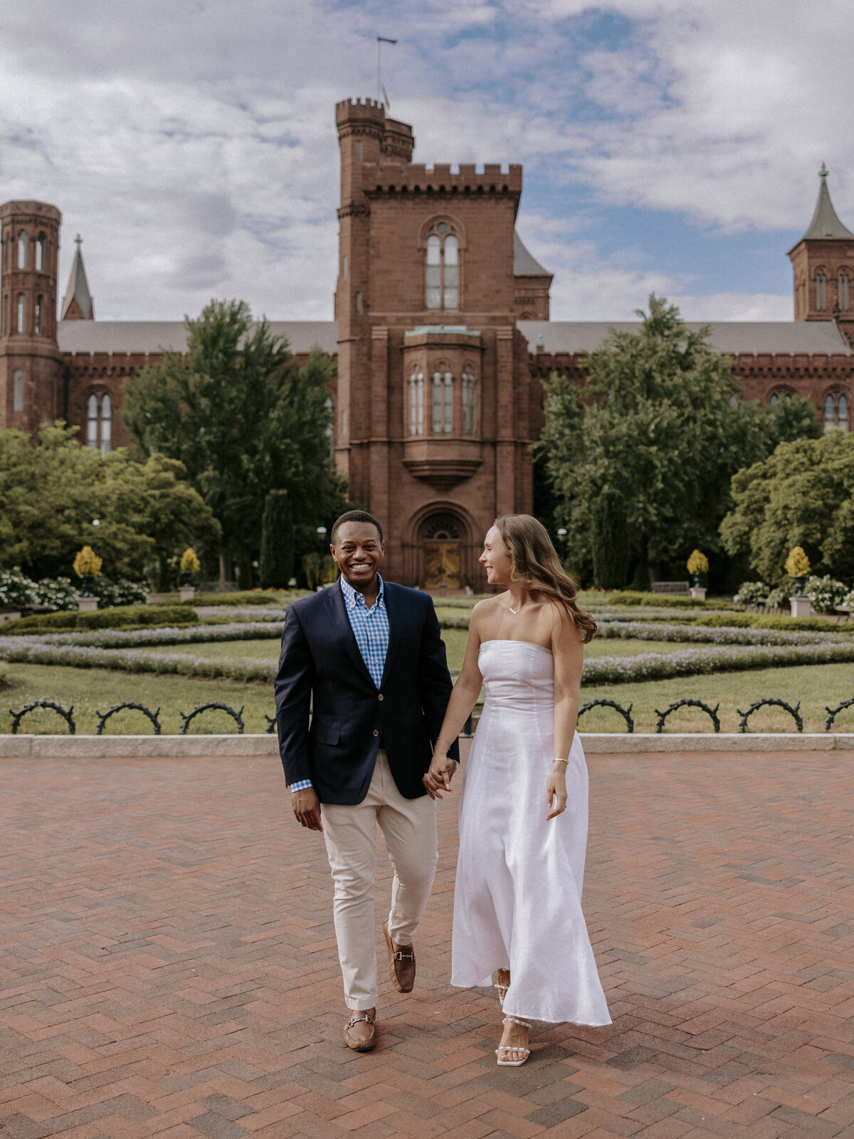 engaged-couple-strolling-near-castle-3