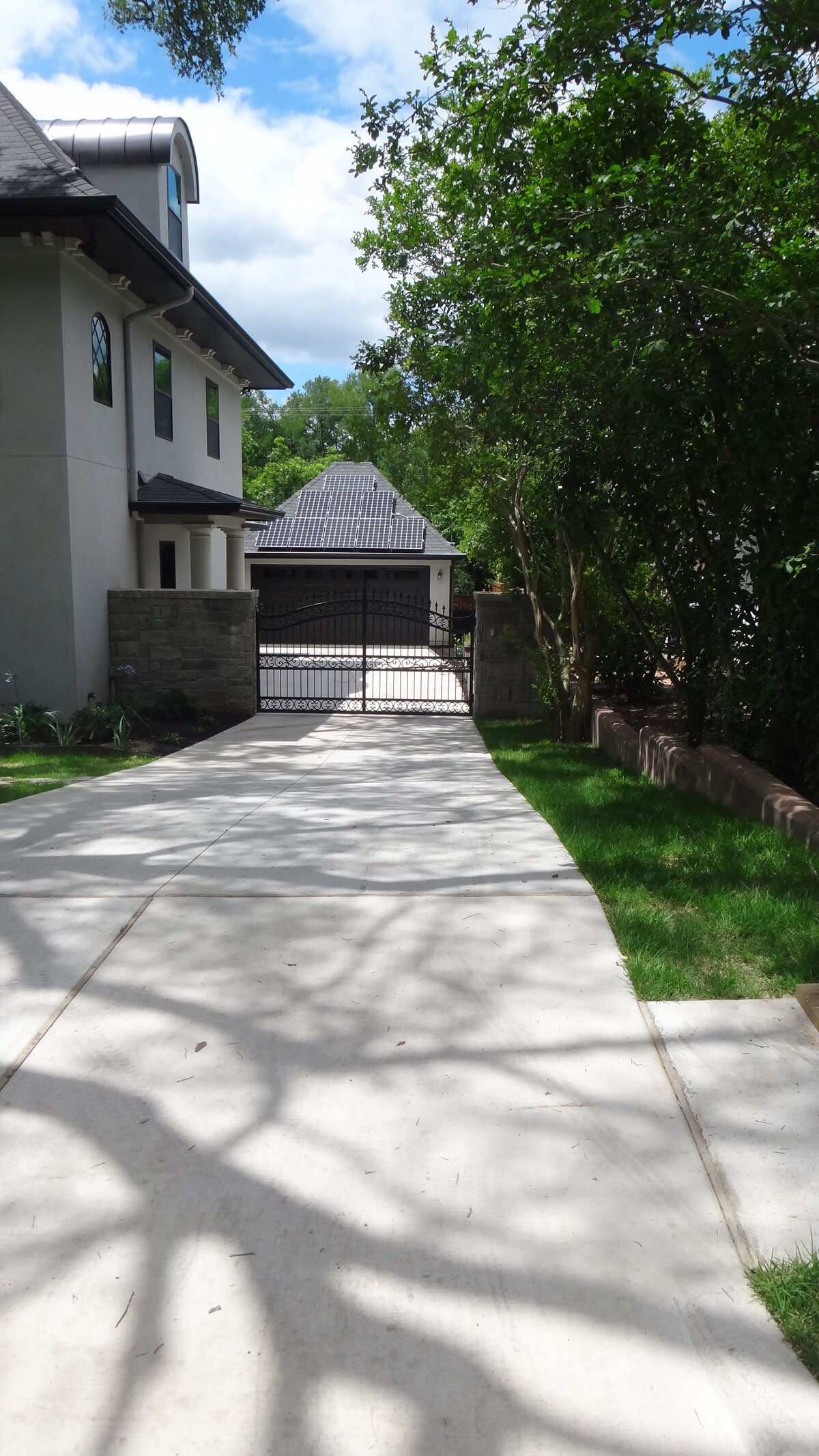 extra long heated driveway with automated driveway gate.