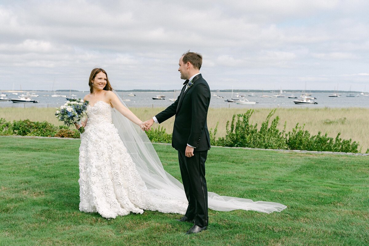 Bride and Groom overlooking Hyannis Port Yacht Club at a wedding in Cape Cod