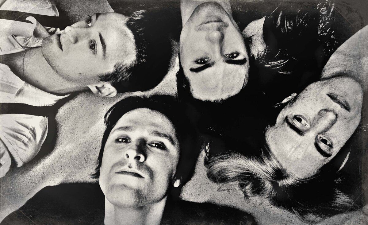 Rock band portrait TV Heart Attack black and white close up lying  on backs