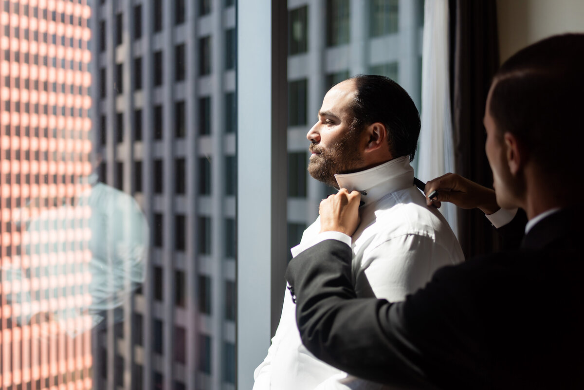 groom getting ready at fairmont hotel