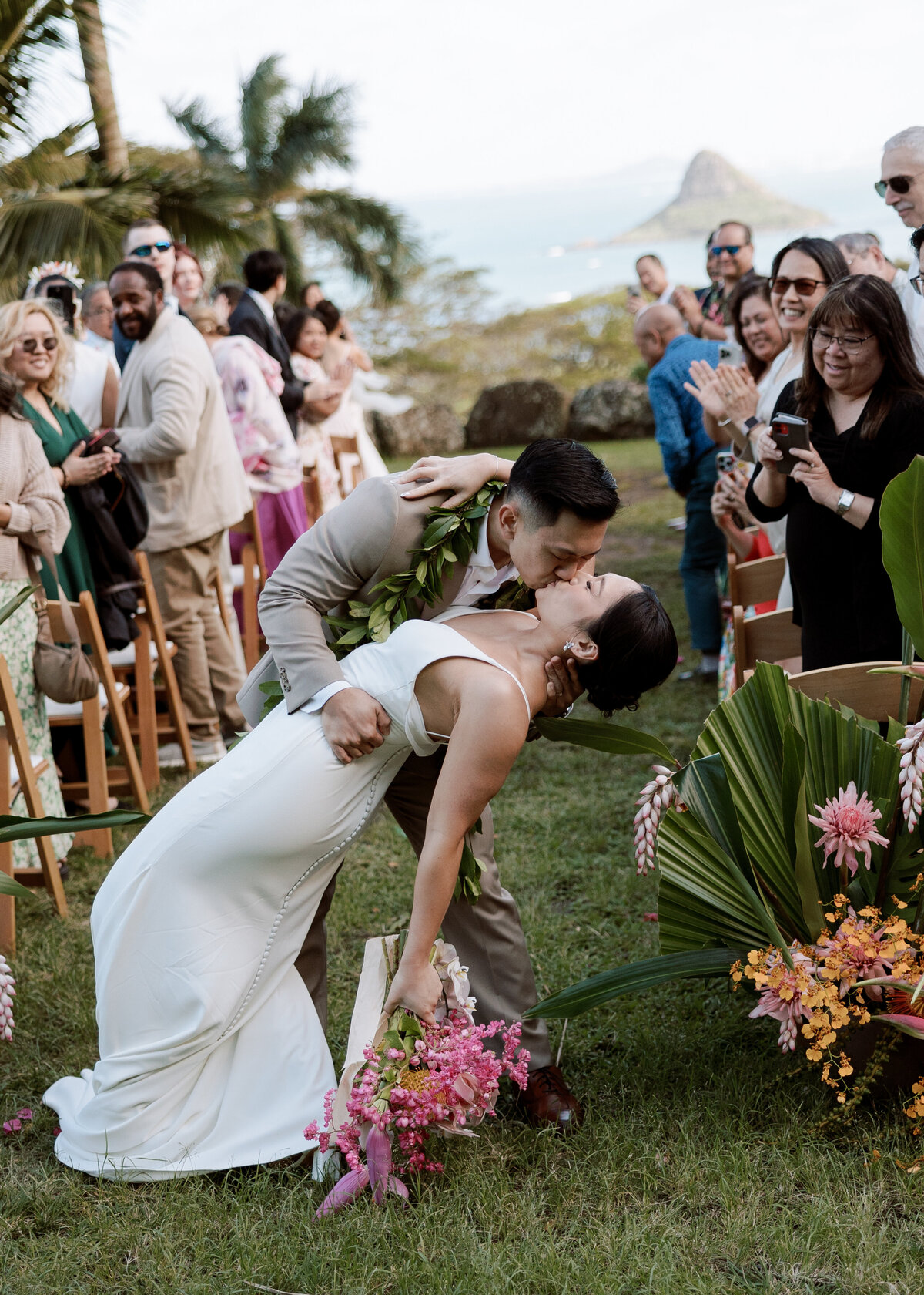 Romantic and passionate first kiss down the aisle, captured in a candid wedding photography style — Carmel wedding photography by Kate Winters Photography.