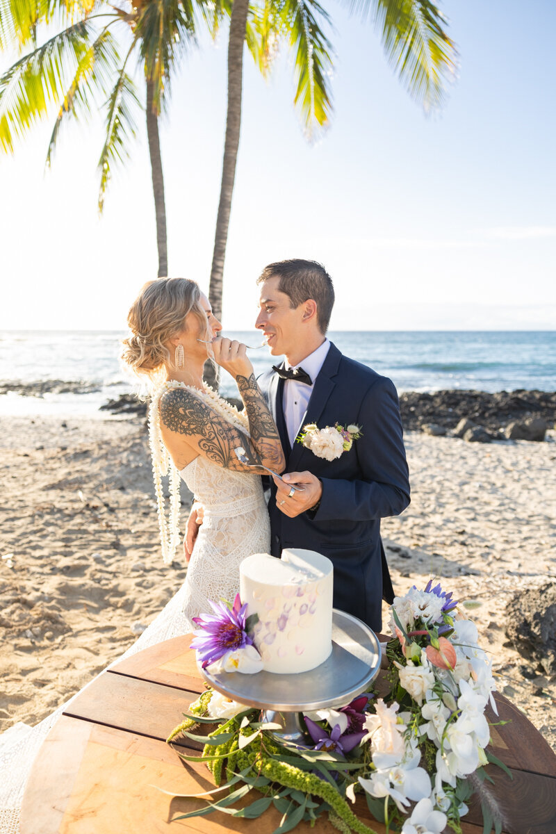 Big Island Wedding Photography at Fairmont Orchid - groom and bride cake cutting