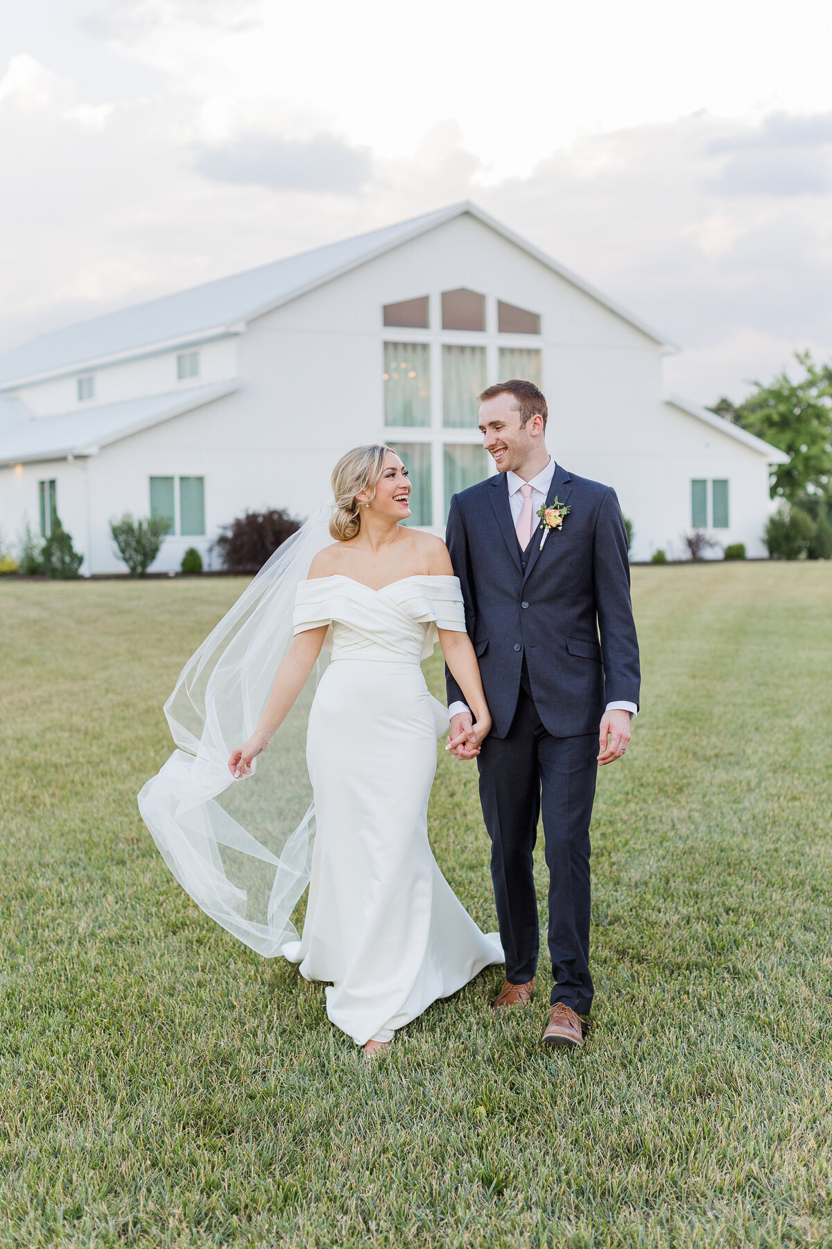 Sunset portraits at Emerson fields wedding venue in Excello Missouri