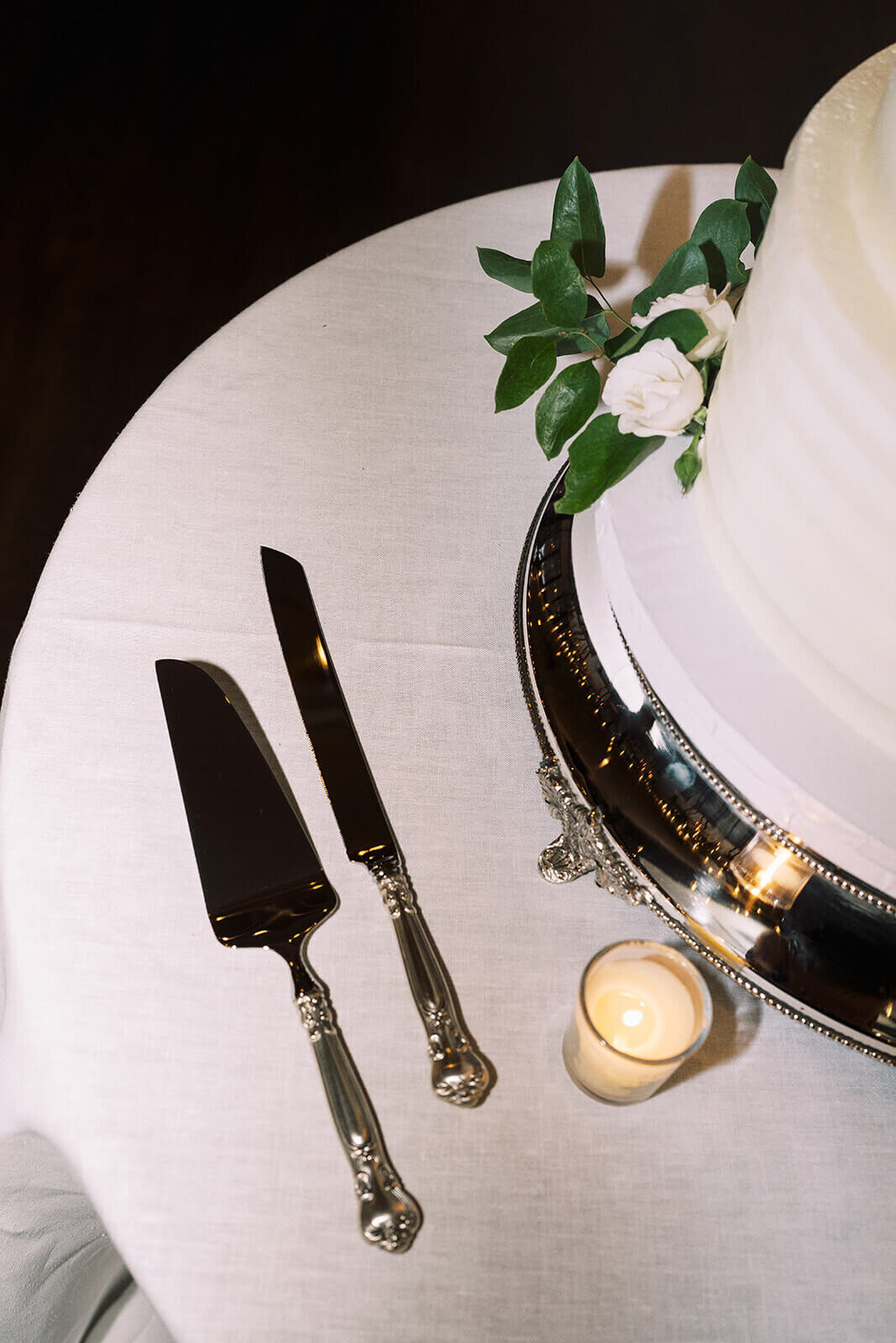 40. white-wedding-cake-cutting-table-vintage-knife-candlelight