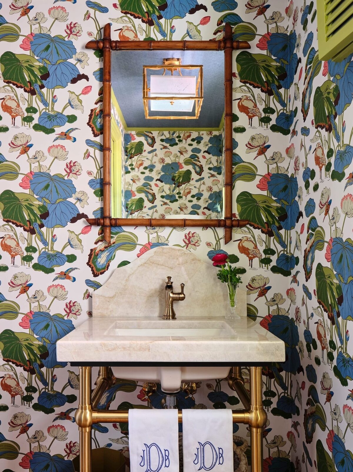 the keeping room interiors morningside bathroom vanity with colorful blue and green wallpaper