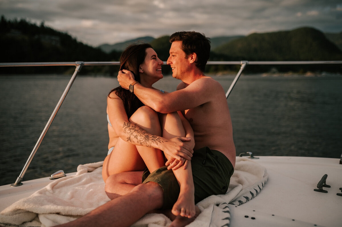 Couple smiling on a boat