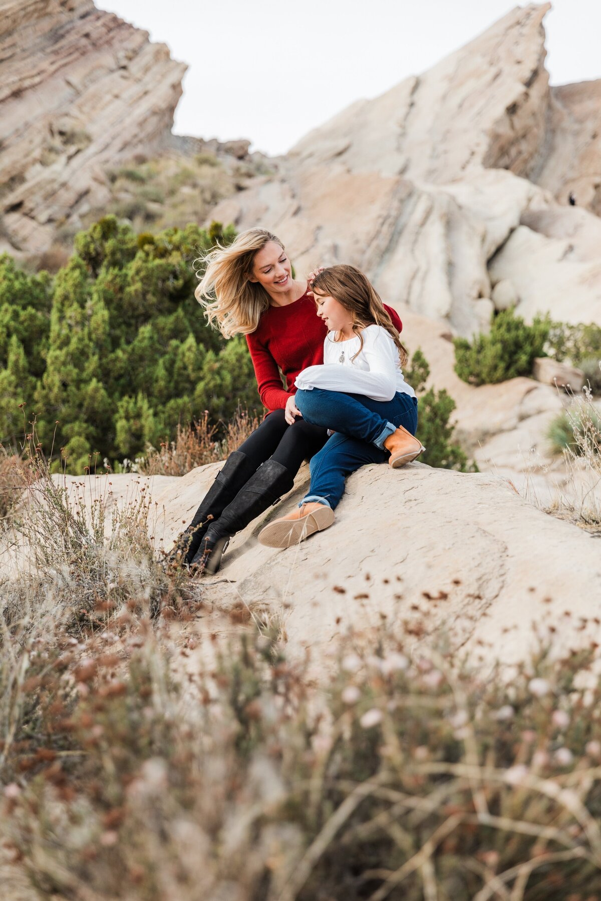 mother-and-daughter-sitting-at-Vasquez-rocks