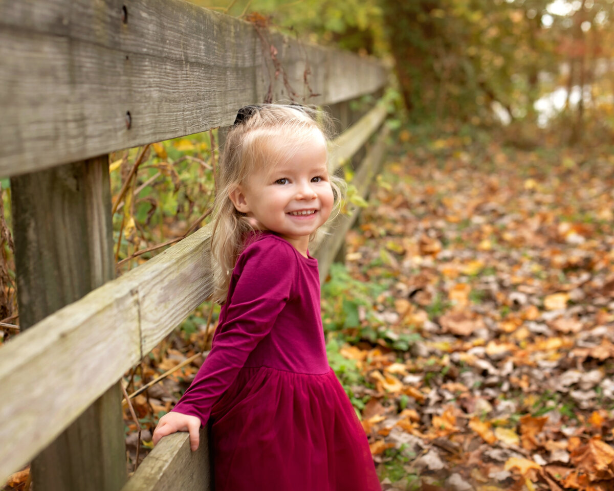 Smiling girl in fall