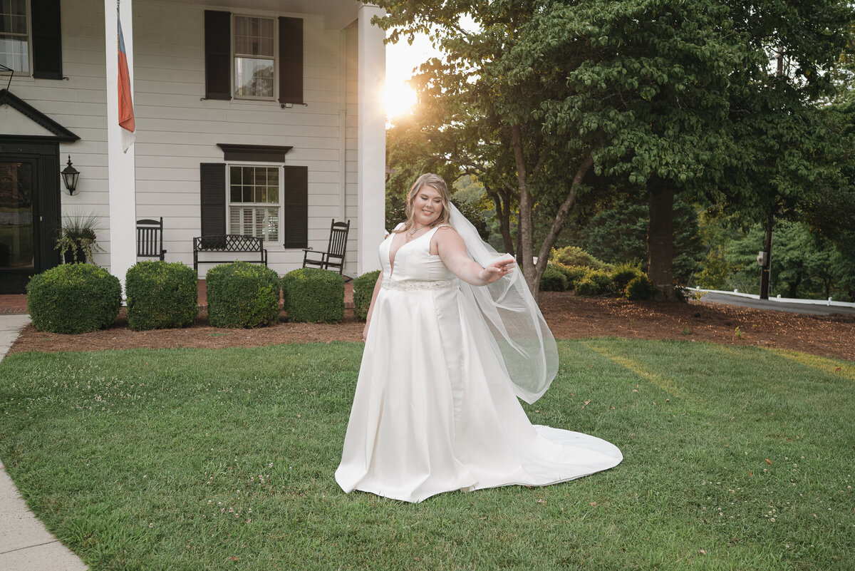 bride playing with veil 
