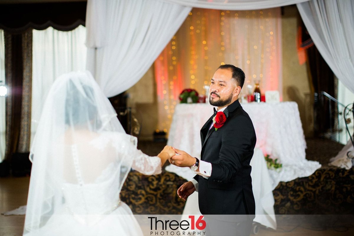 Bride and Groom share their first dance