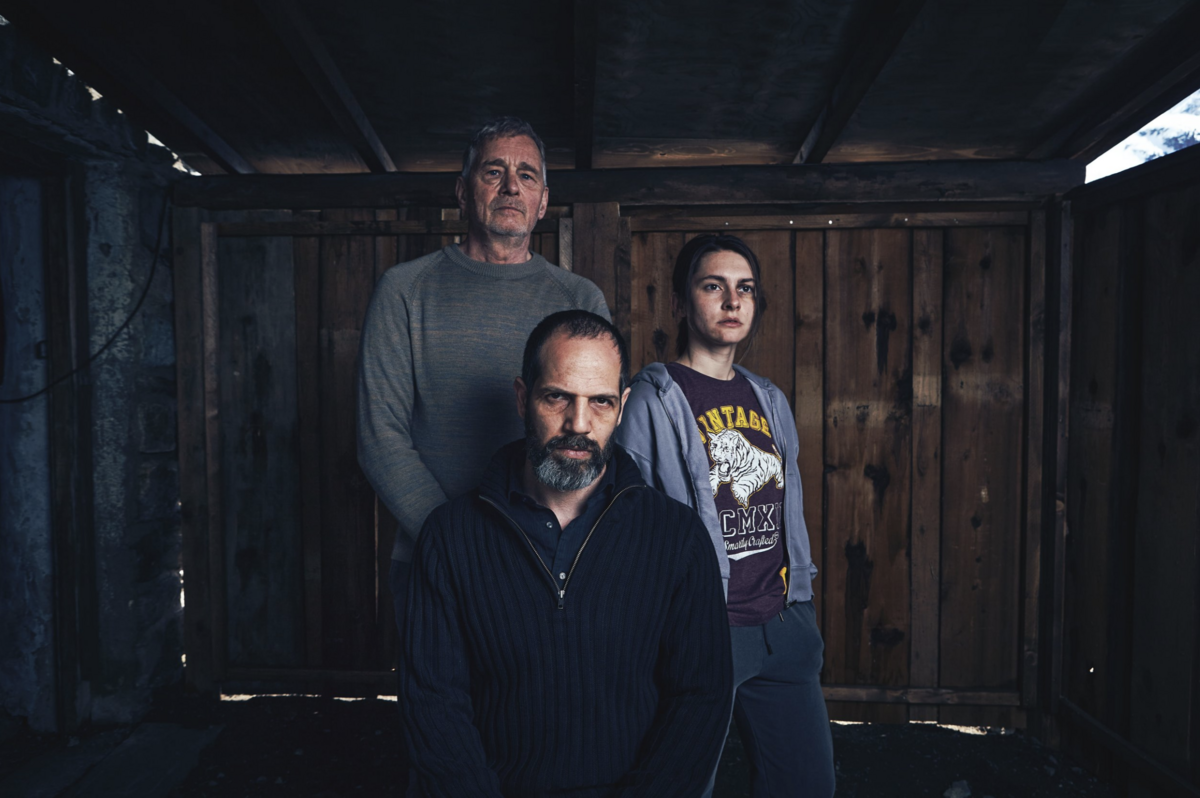 A stylized portrait using directional light and shallow depth of field.