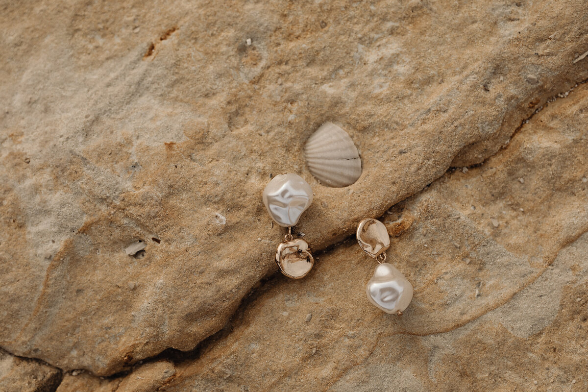 kaboompics_simplicity-by-the-sea-minimalist-jewelry-on-maltas-rocky-beach-31104
