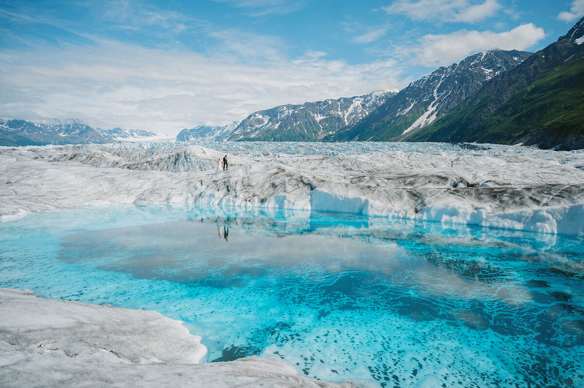 couple hike on glacier