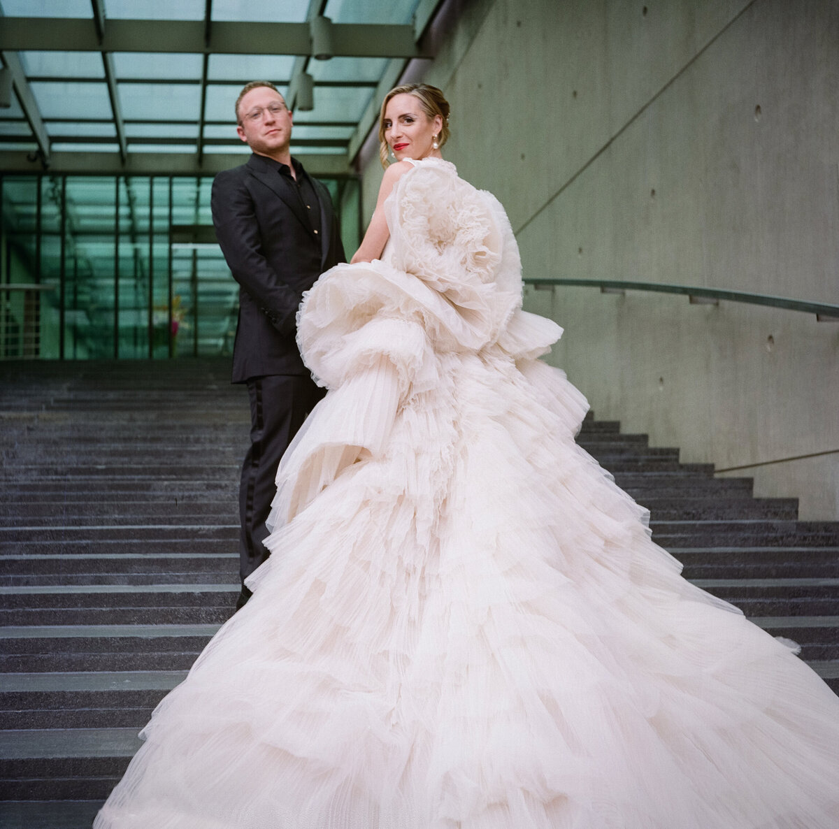 Bride and groom portrait, bride train couture gown