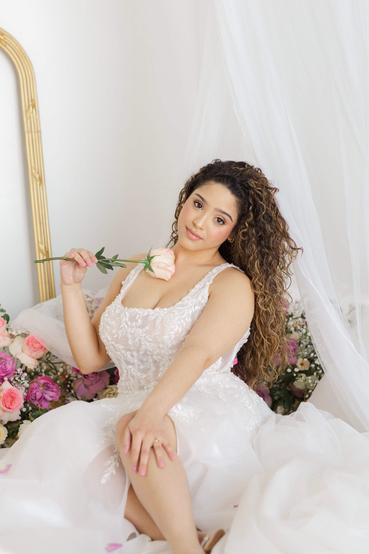 bridal portrait with a peach colored  rose