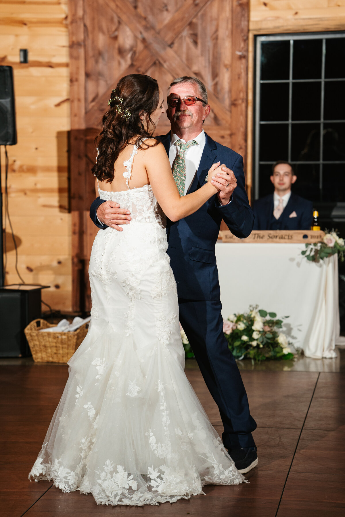 Reception decor featuring rustic charm and romantic candlelight