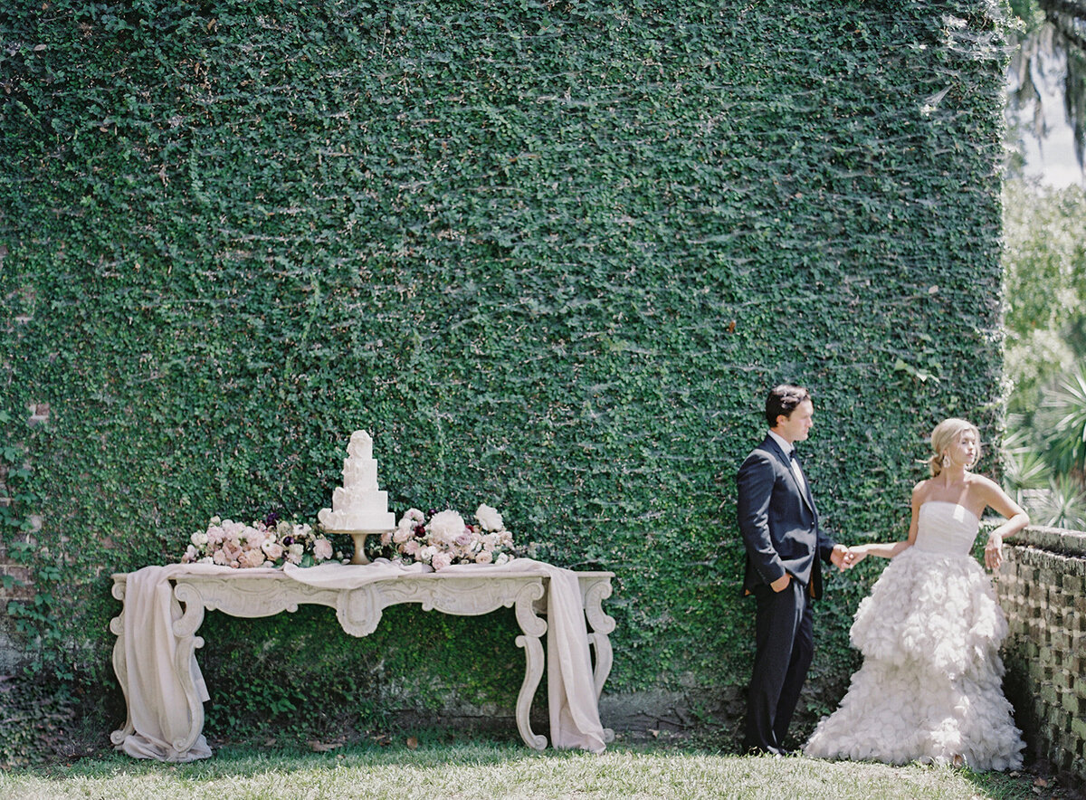 Luxury bride and groom in front of castle