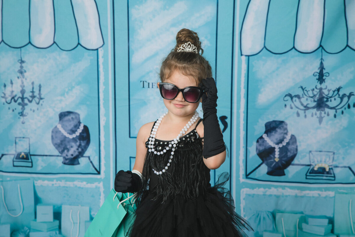 girl-in-black-dress-tiffanys-inspired-background-and-sunglasses-arlington-tx