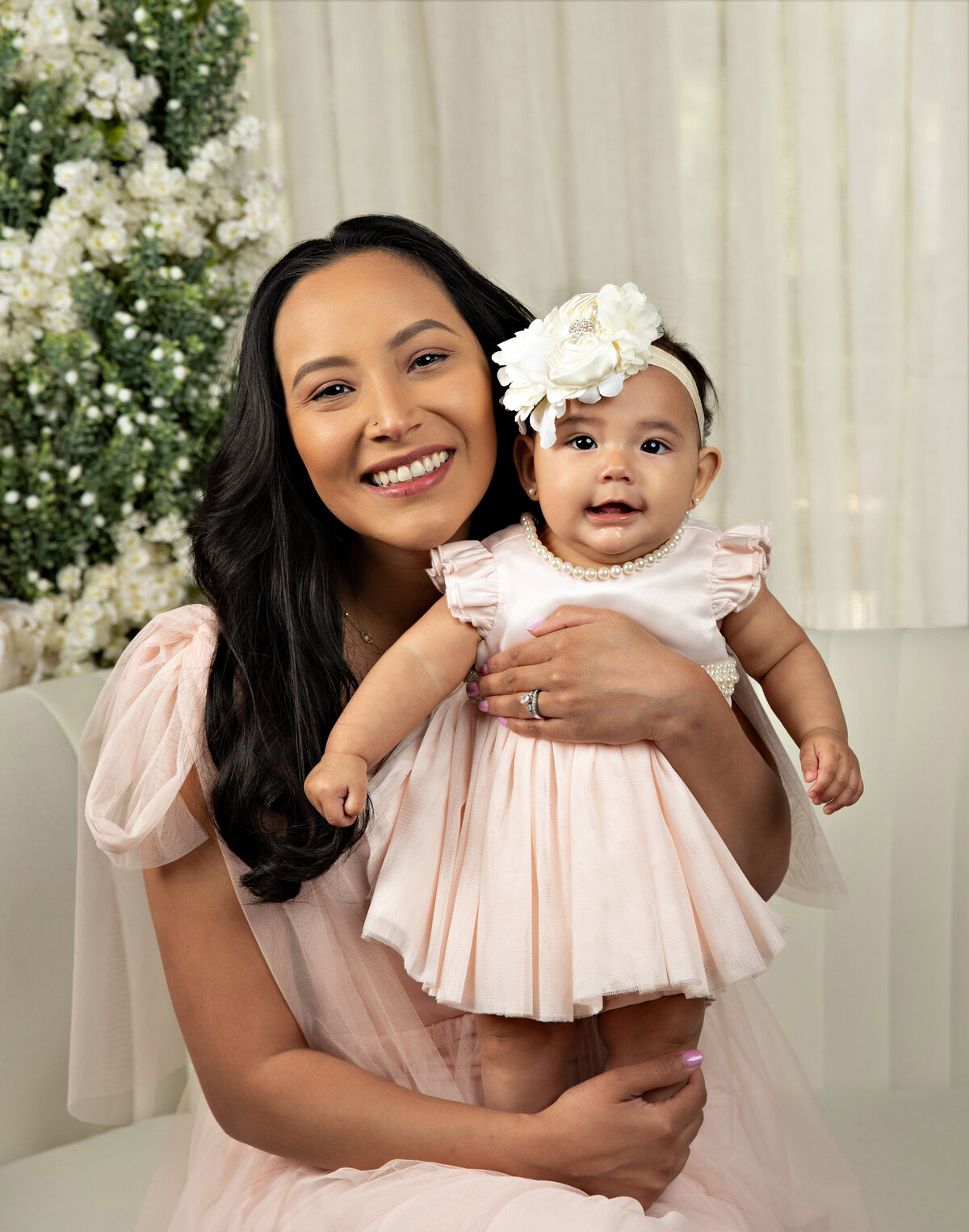 smiling mom with baby girl floral custom set image by best san antonio baby family photoographer 