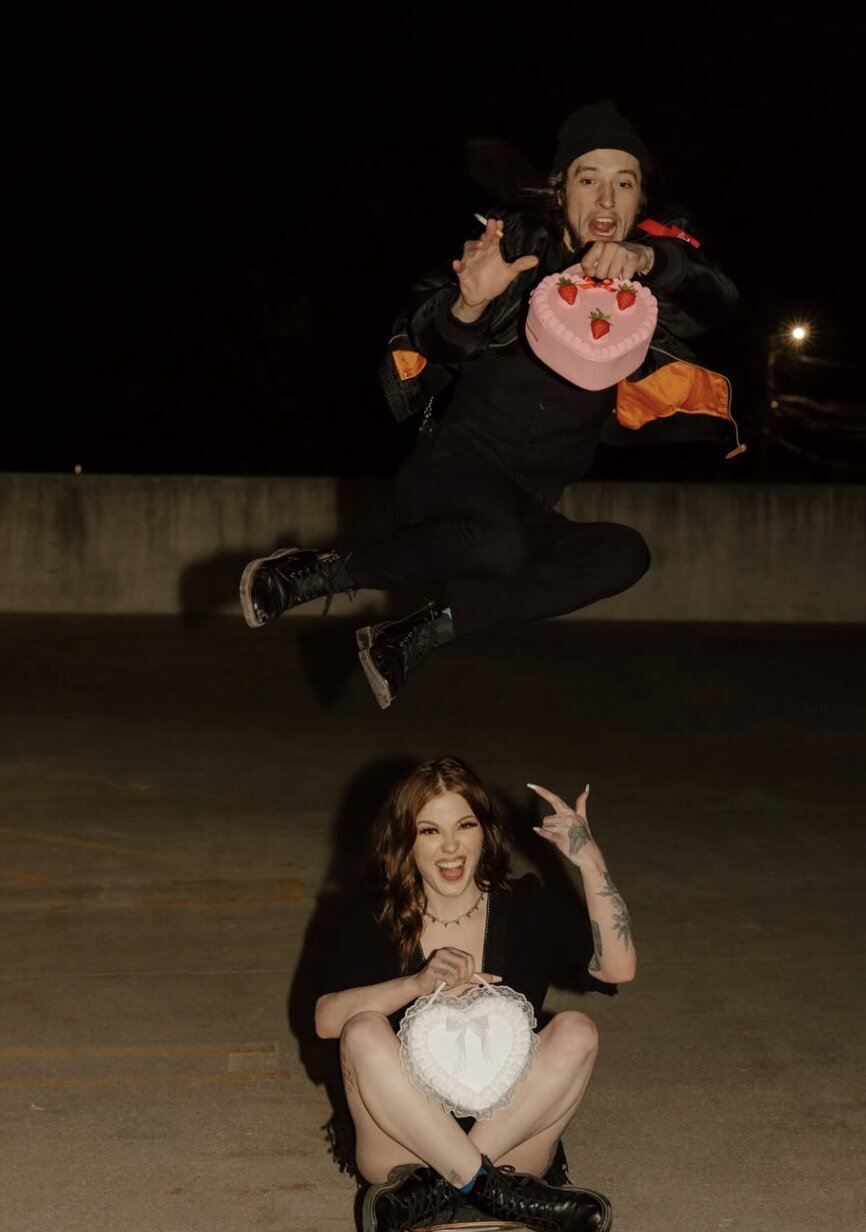 cool-punk-gothic-couple-jumping-on-garage-roof-meg-pearson-photography