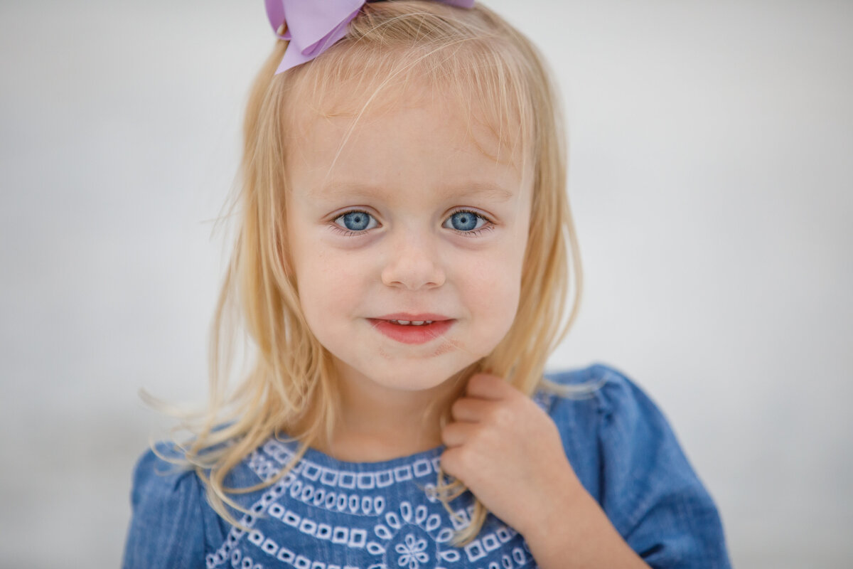 little girl with blue eyes on the beach 30a