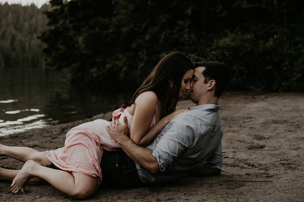 sexy engaged couple at white pine beach