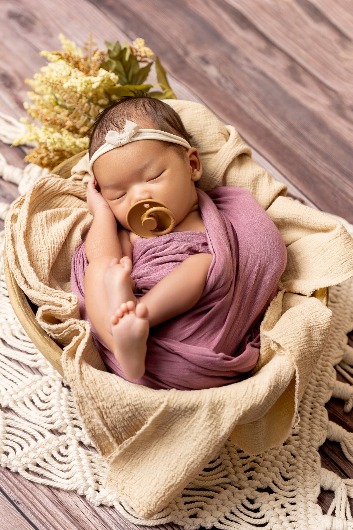 DMV - Photobyshai -Newborn wrapped up and laying in a bowl 