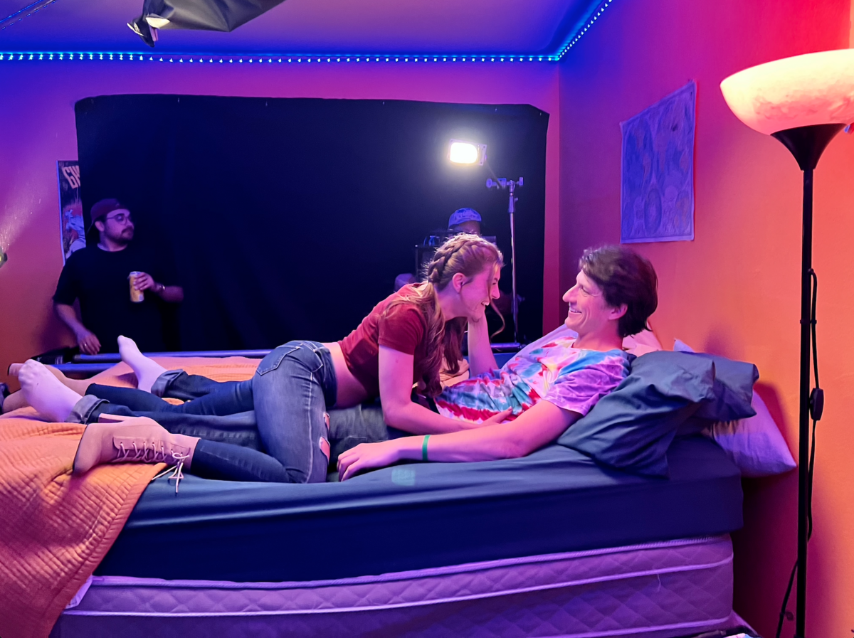Scene from MAMP film showing  man and woman lying in bed