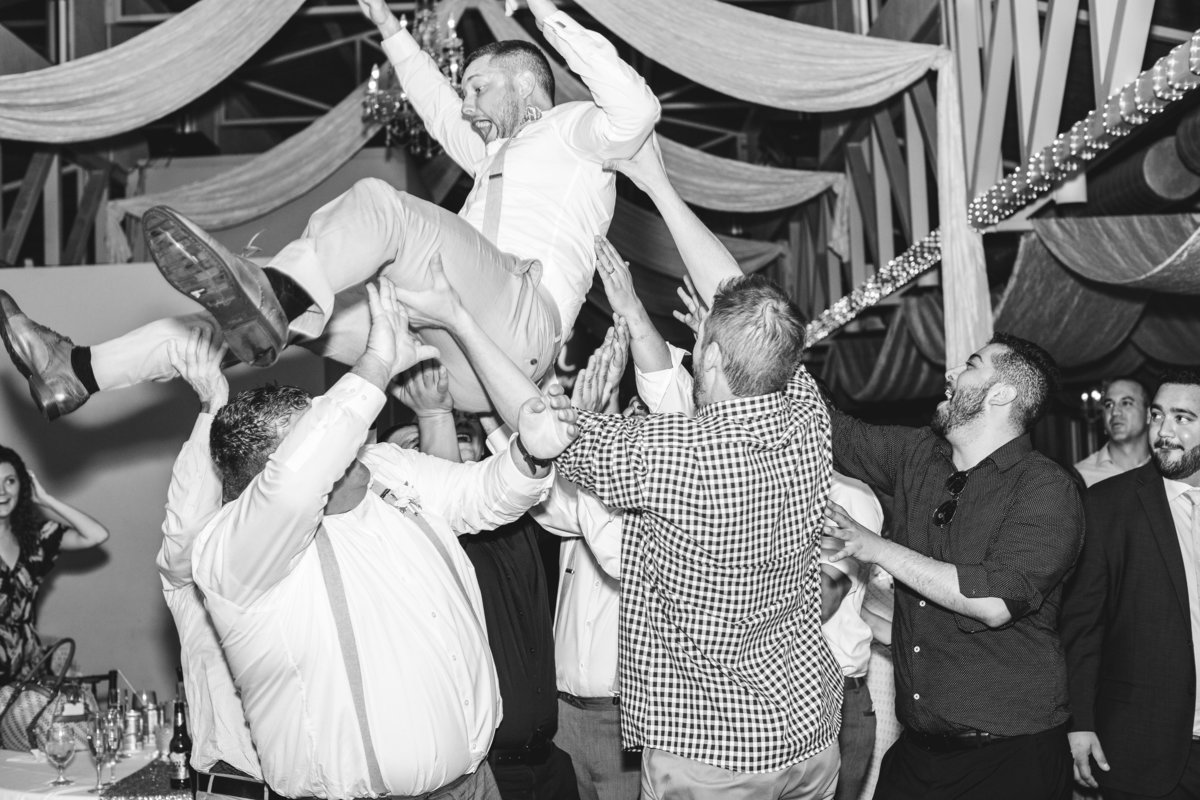 terrace club wedding photographer groom flying reception 2600 US-290, Dripping Springs, TX 78620