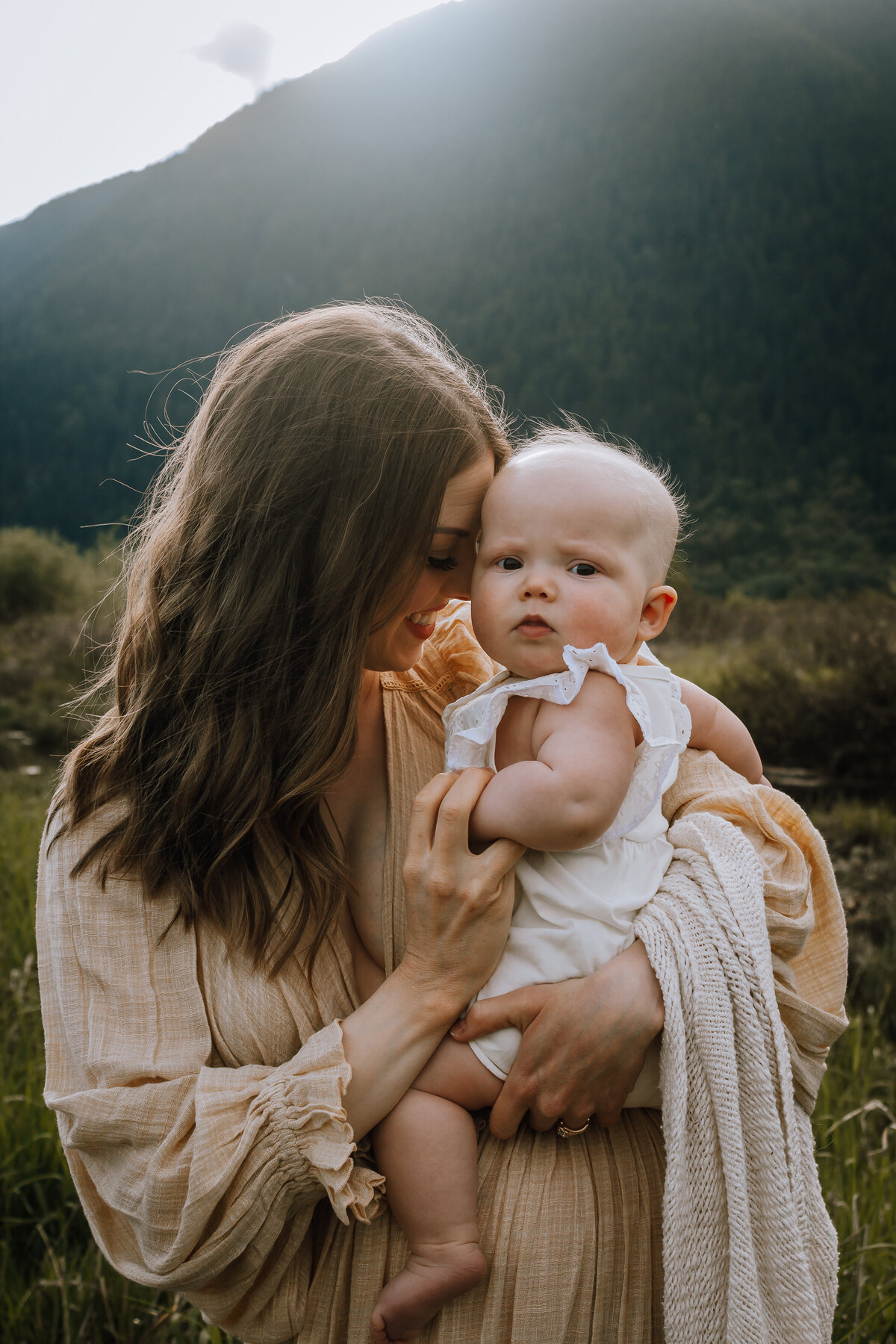 A Mama and her sweet babe during a Mother's Day mini session at Pitt Lake, Pitt Meadows