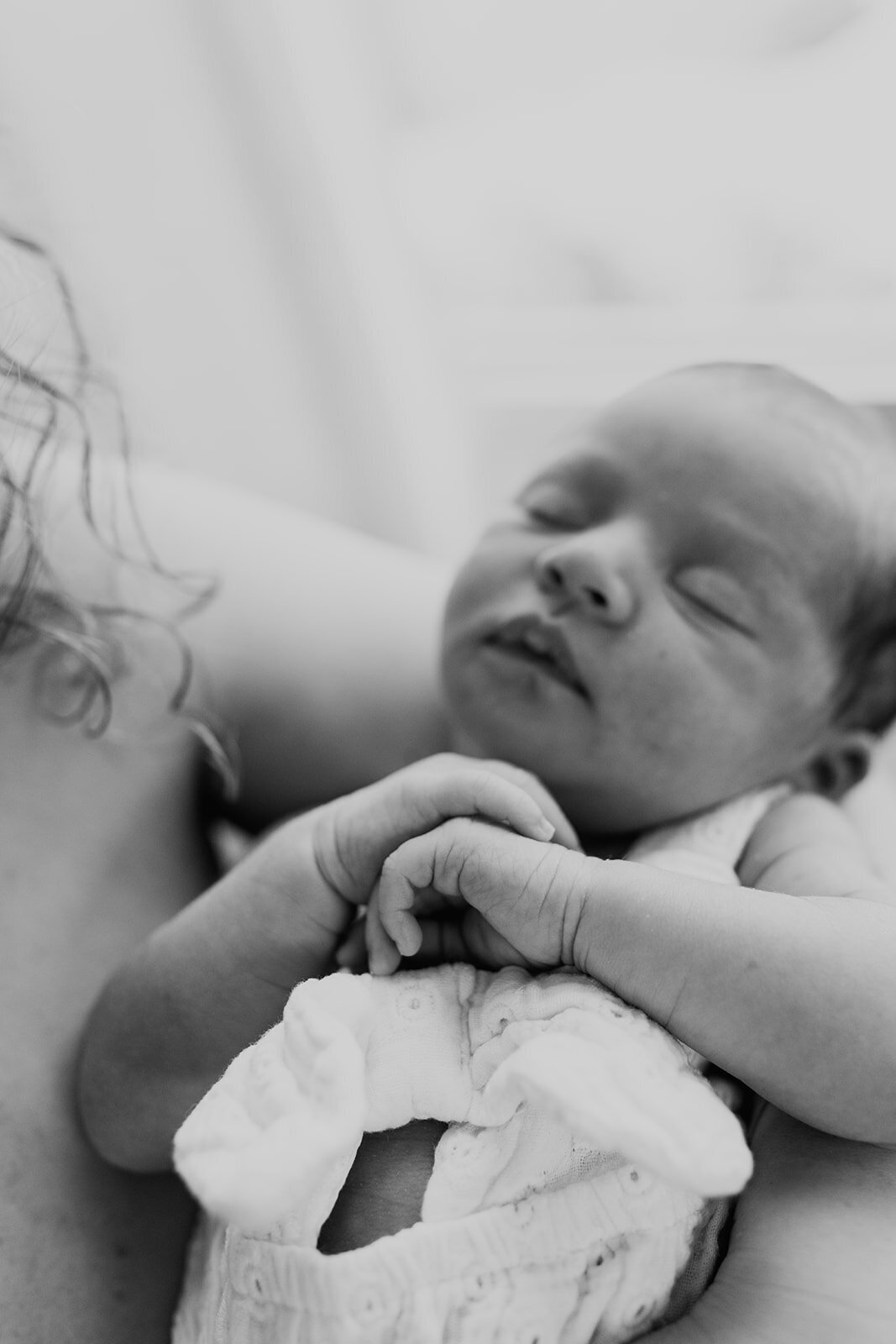 black and white sleeping baby girl