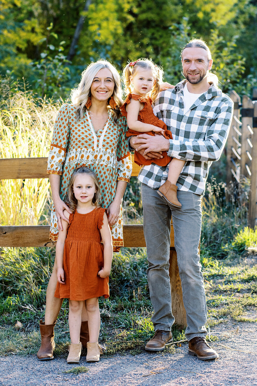 parents and daughters pose for family photography session