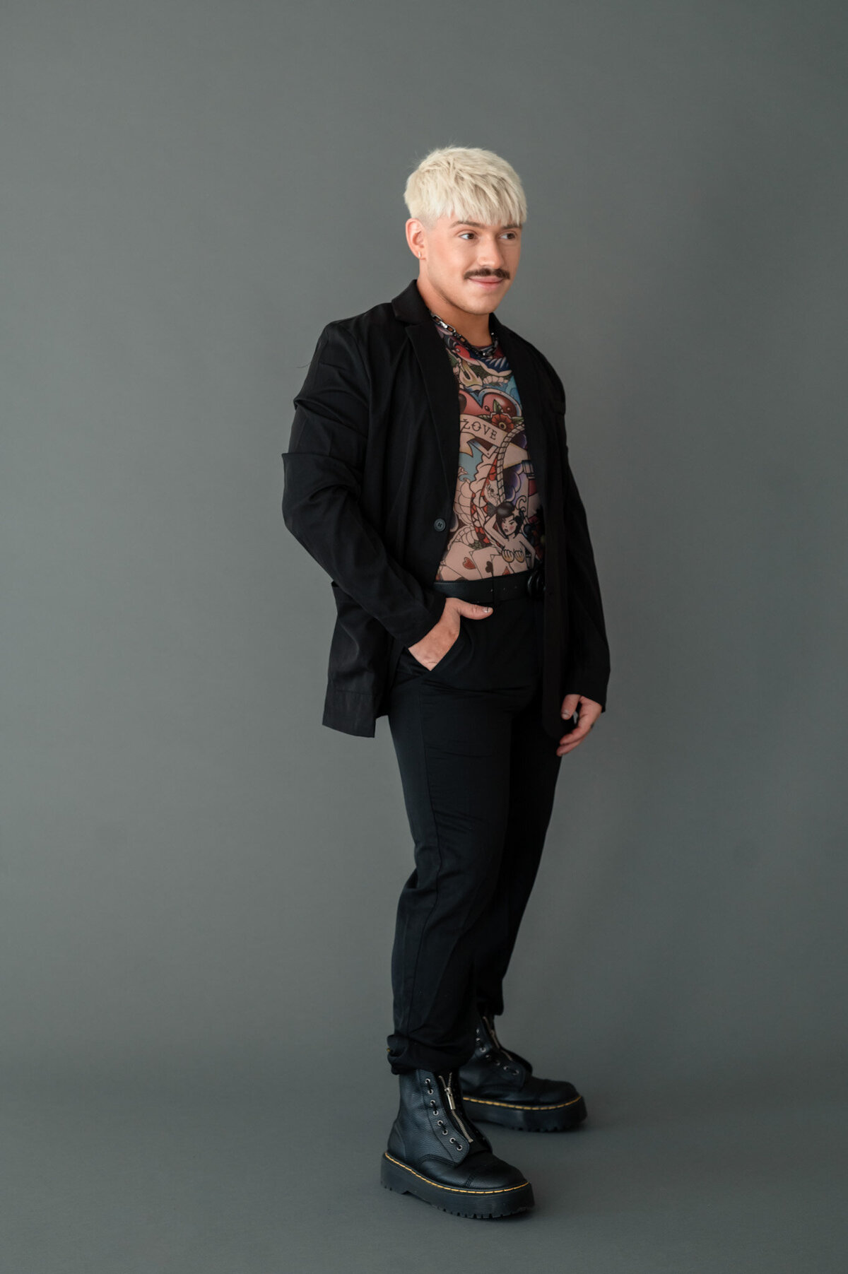 handtiedbyhim-branding-session-holding-hair-color-brushes-jacksonville