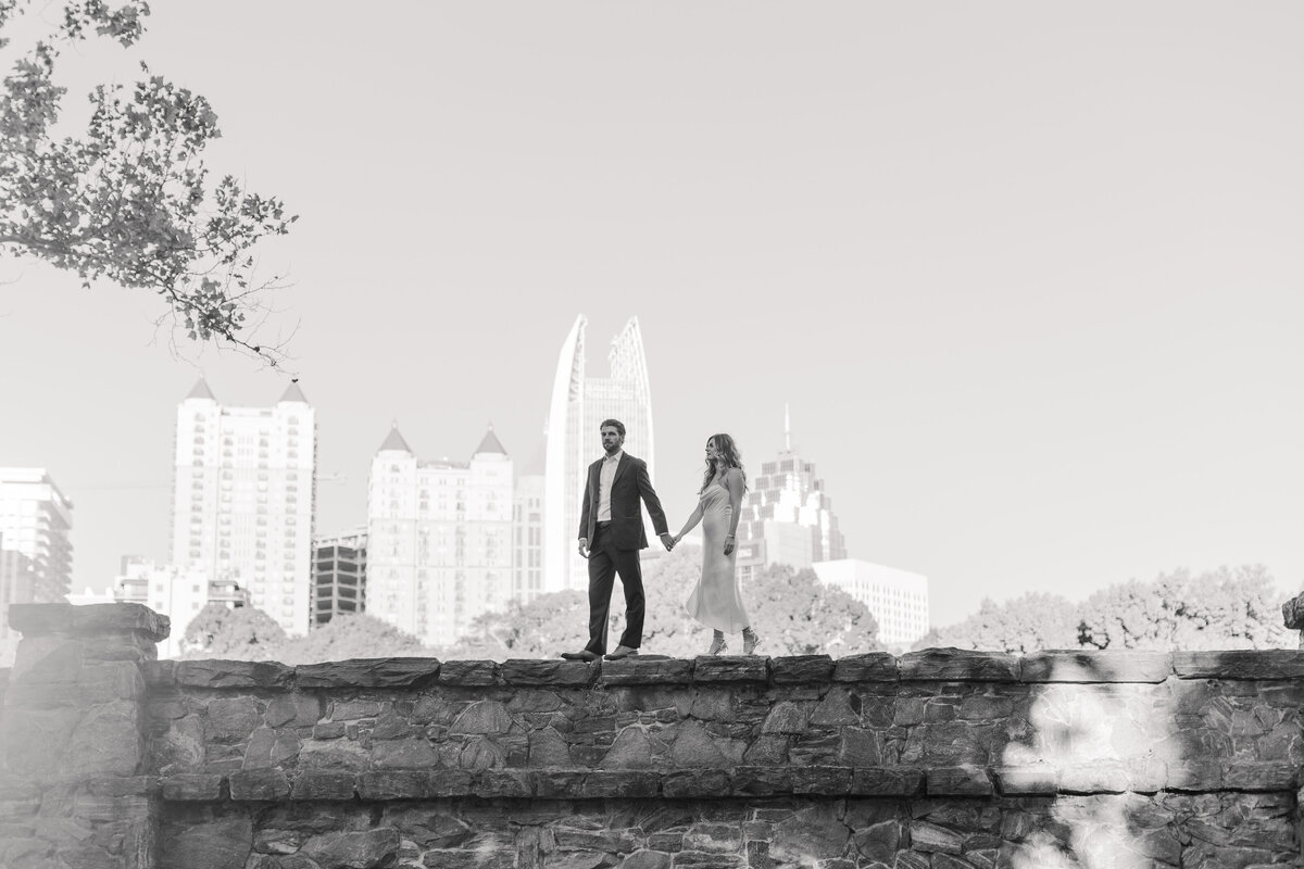 Black and white engagement session image overlooking downtown Atlanta