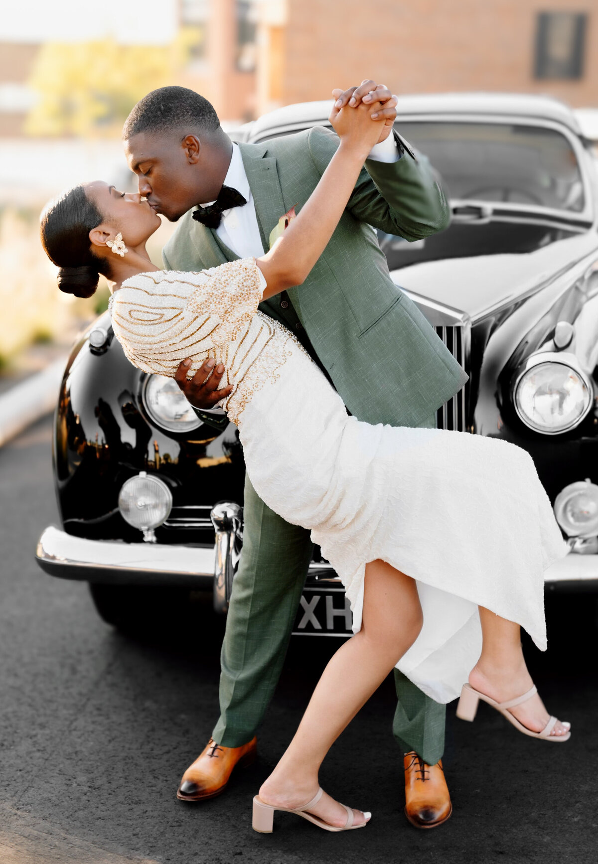 Groom and bride kissing in High Point, NC.