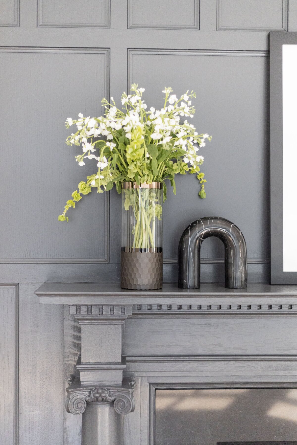 dark-fireplace-mantel-floral-decor-brookline-manor