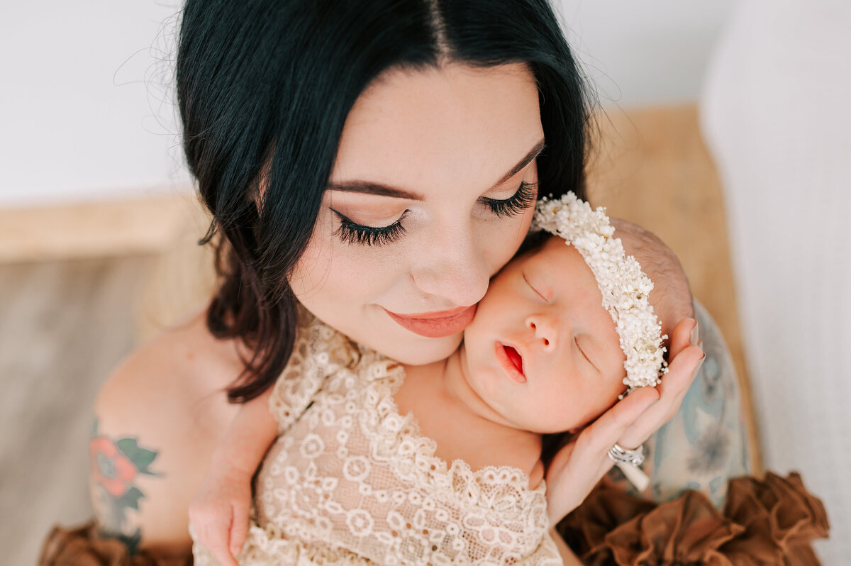 Springfield MO newborn photographer captures mom and baby girl faces close up