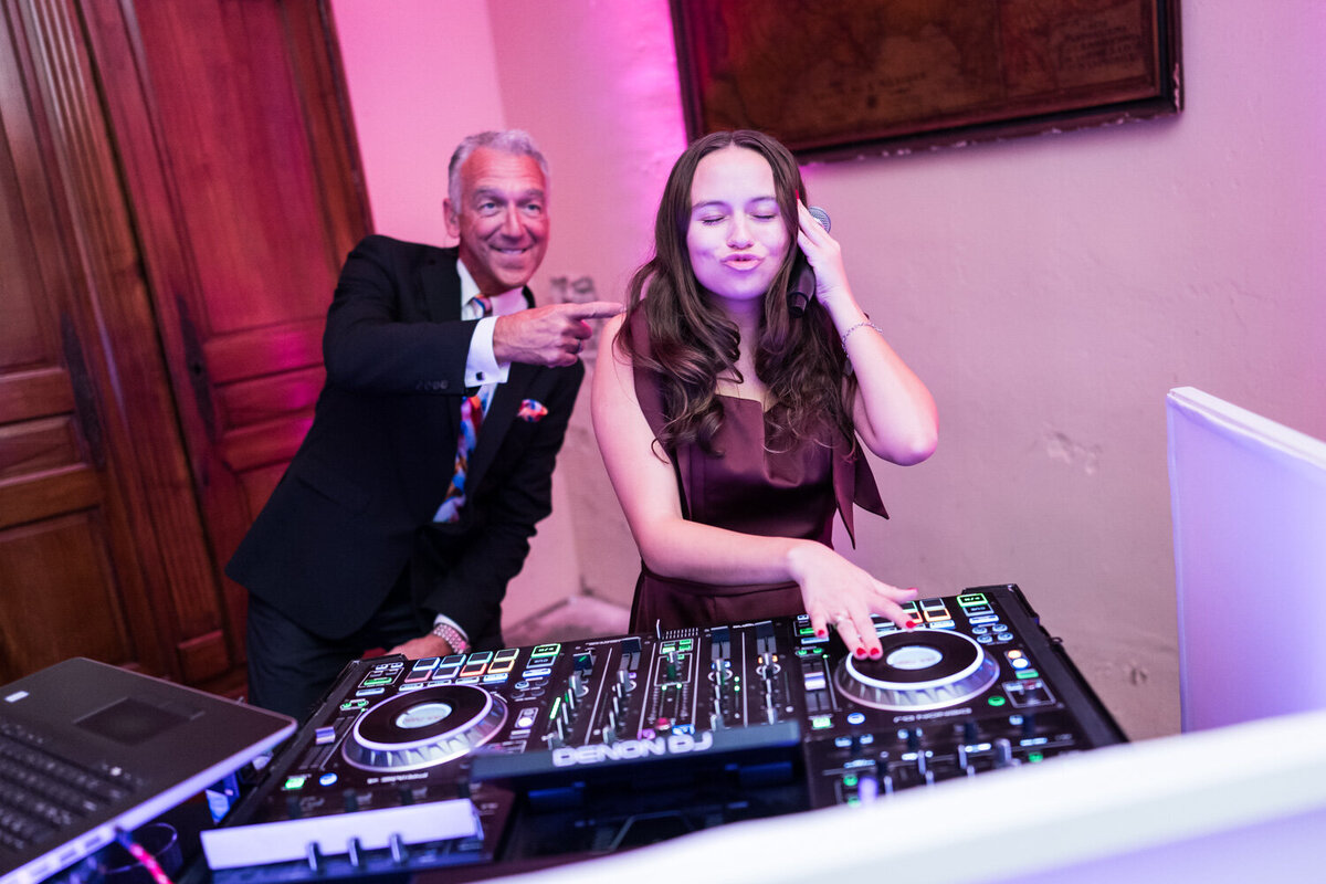 Bridesmaid pretending to be a DJ at Latrobe's