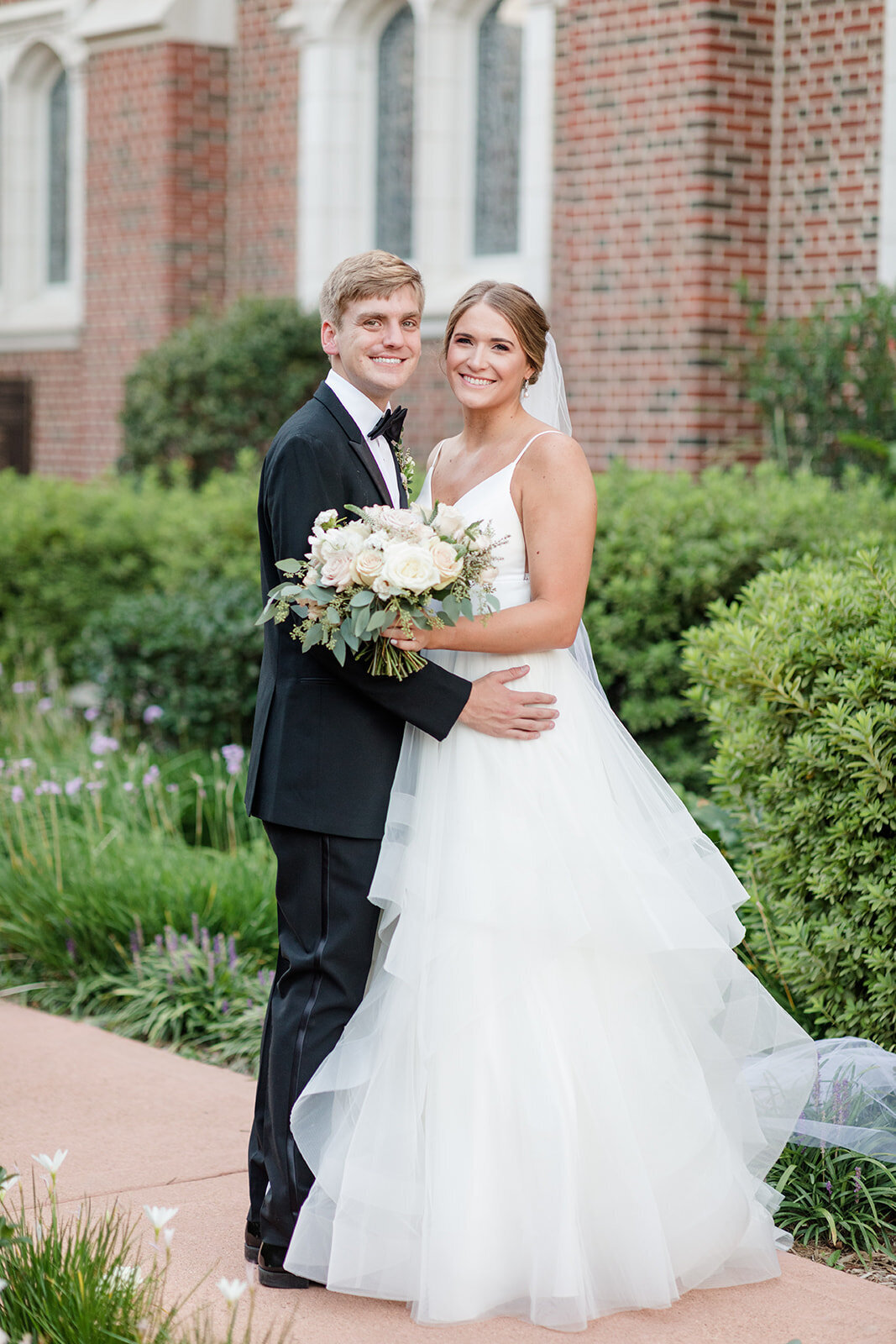 Bride and groom at Cathedral of Saint John Berchmans; Shreveport, Louisiana