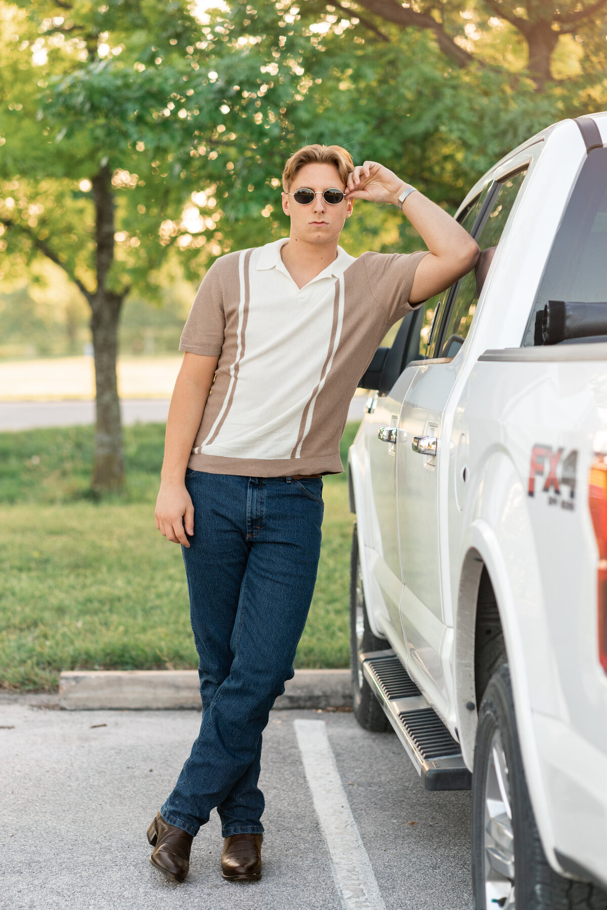 High school senior boy with Truck in Austin Texas.