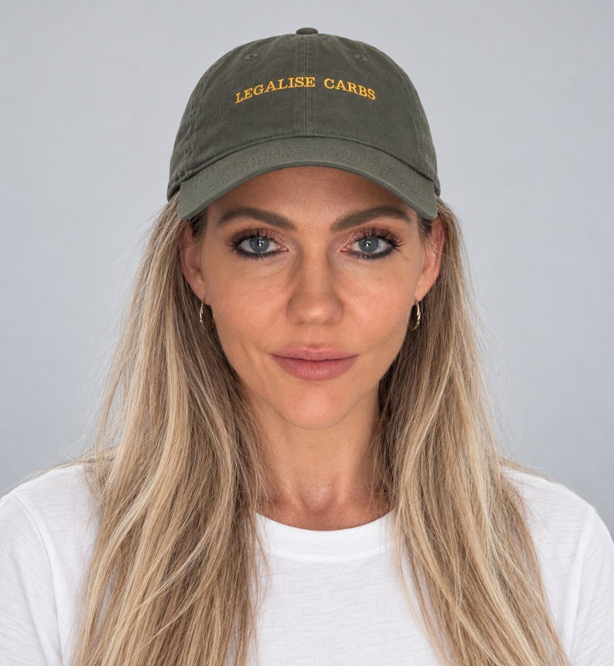 Libby wearing the Legalise Carbs cap